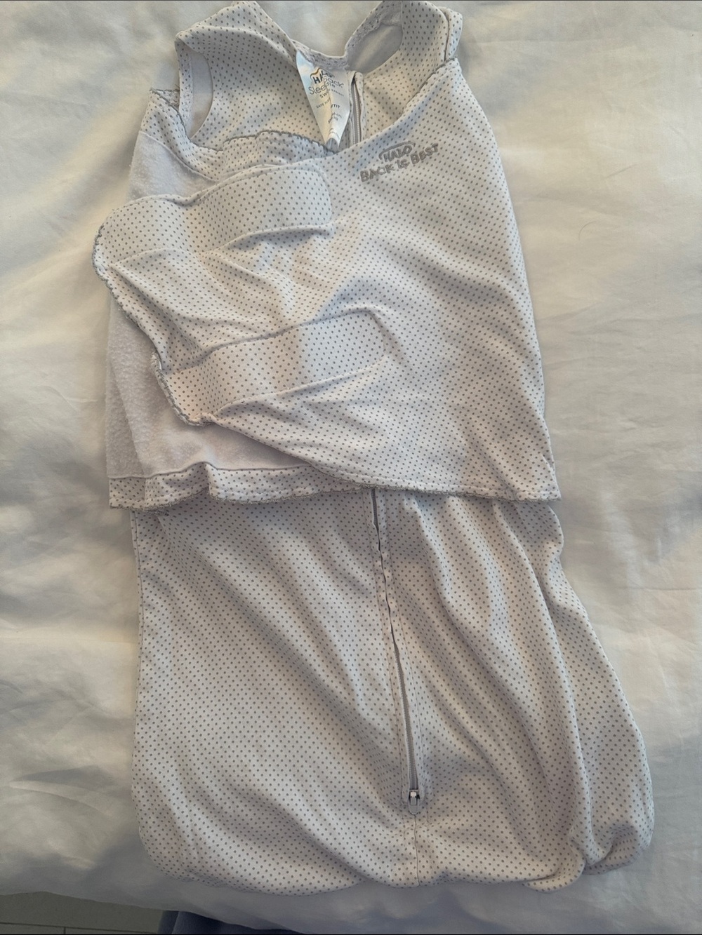 Halo SleepSack zippered Swaddle. White and grey polka dots, 3-6M